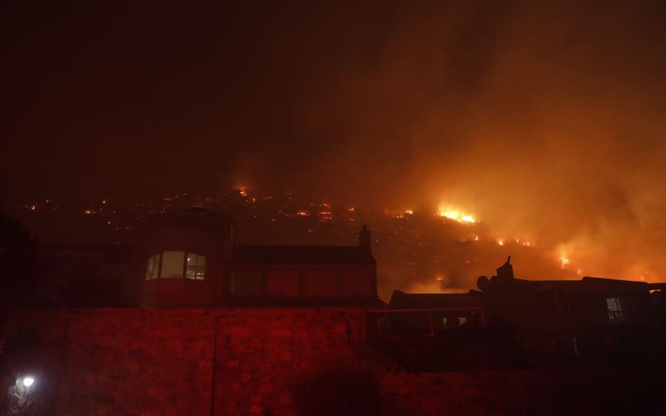 Firefighters battle huge mountain blaze near South Africa's Cape Town 
